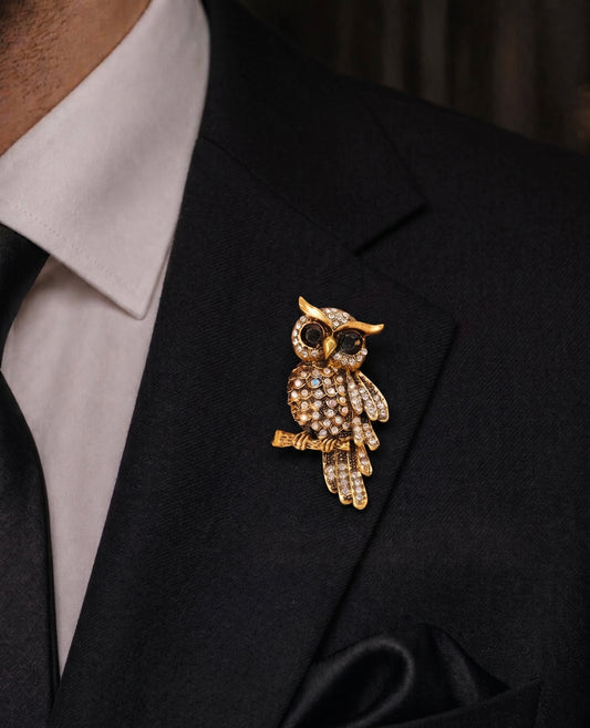 Golden owl brooch