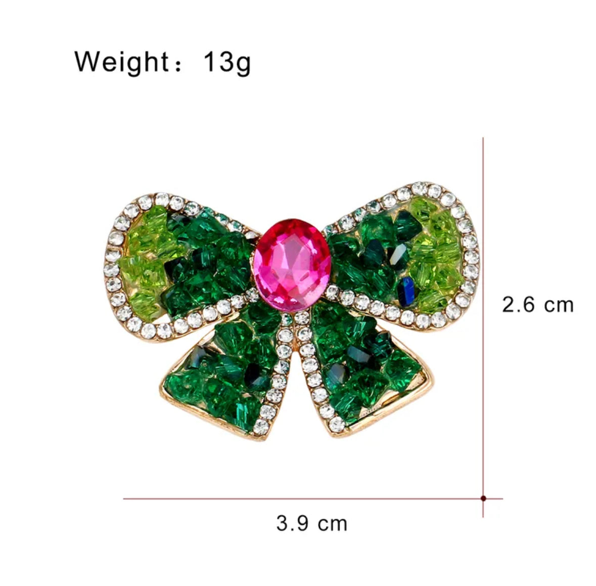 Emerald kiss bow brooch