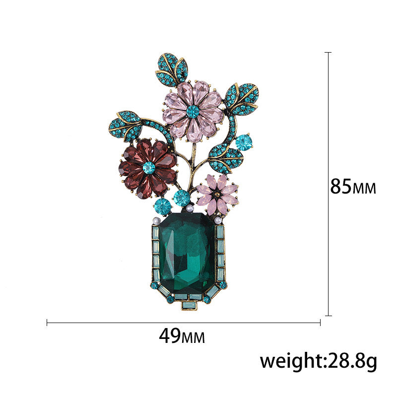 Majestic flower vase brooch