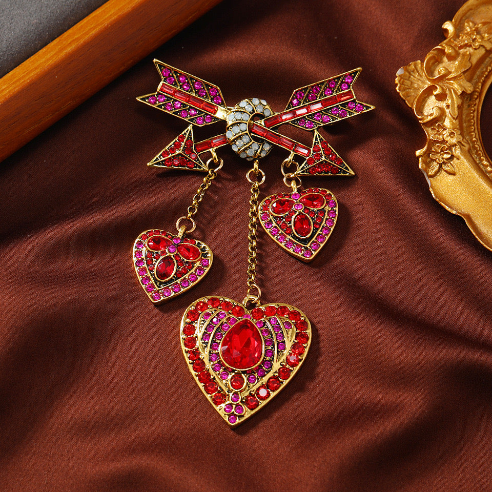 Cupid arrow heart red brooch