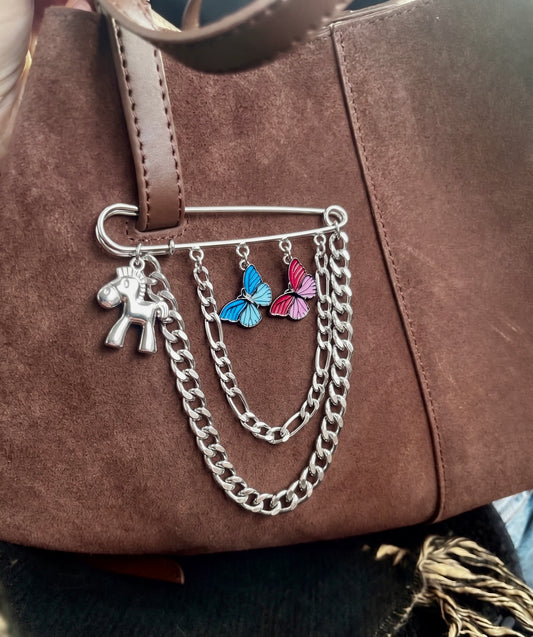 Silver flutter charm bag pin