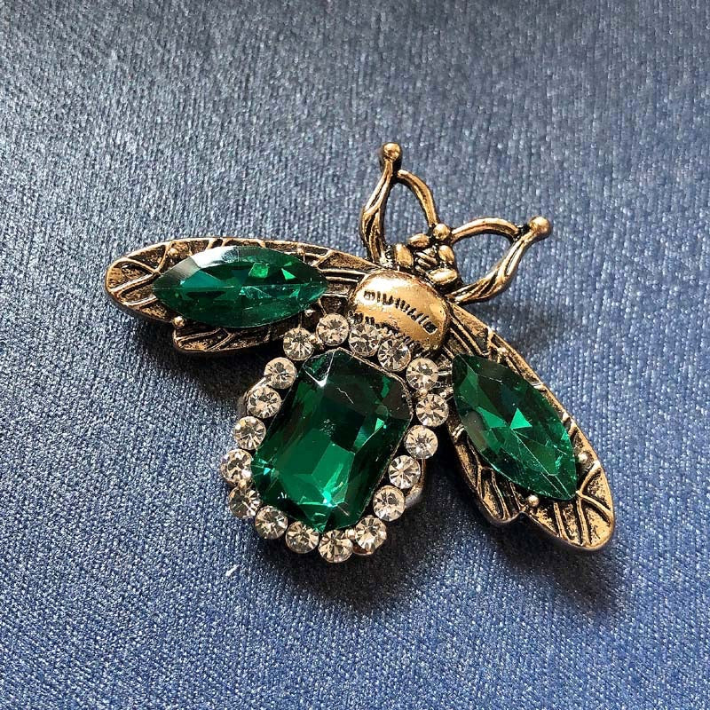 Green gemstone fly brooch