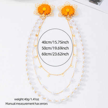 Multi layer pearl body chain brooch