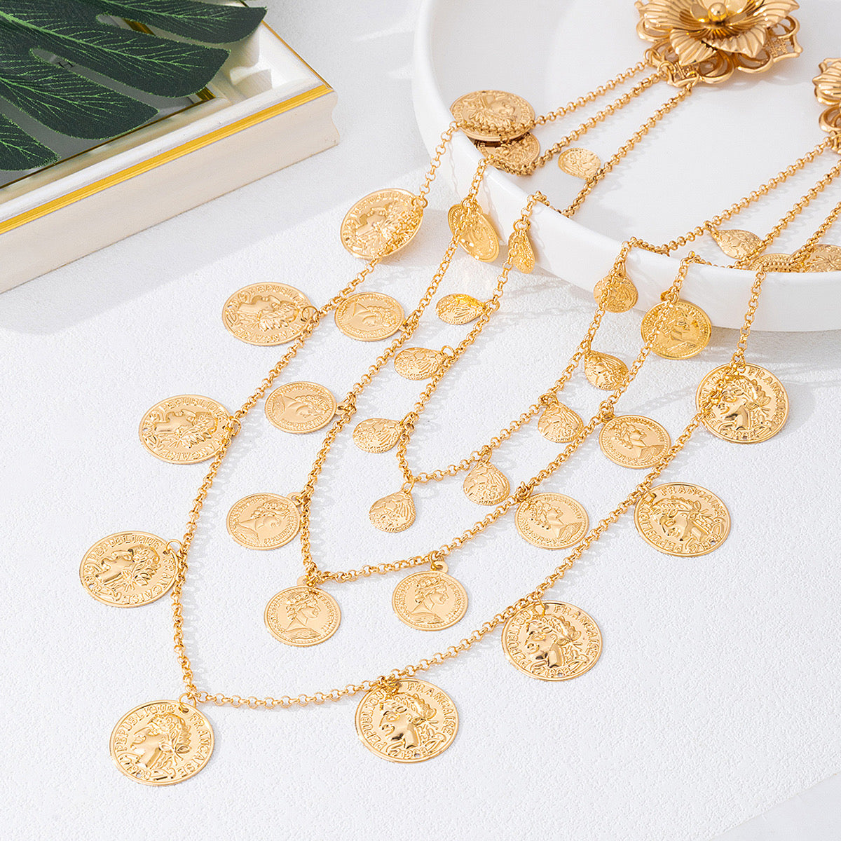 Multi layer tassel body chain brooch