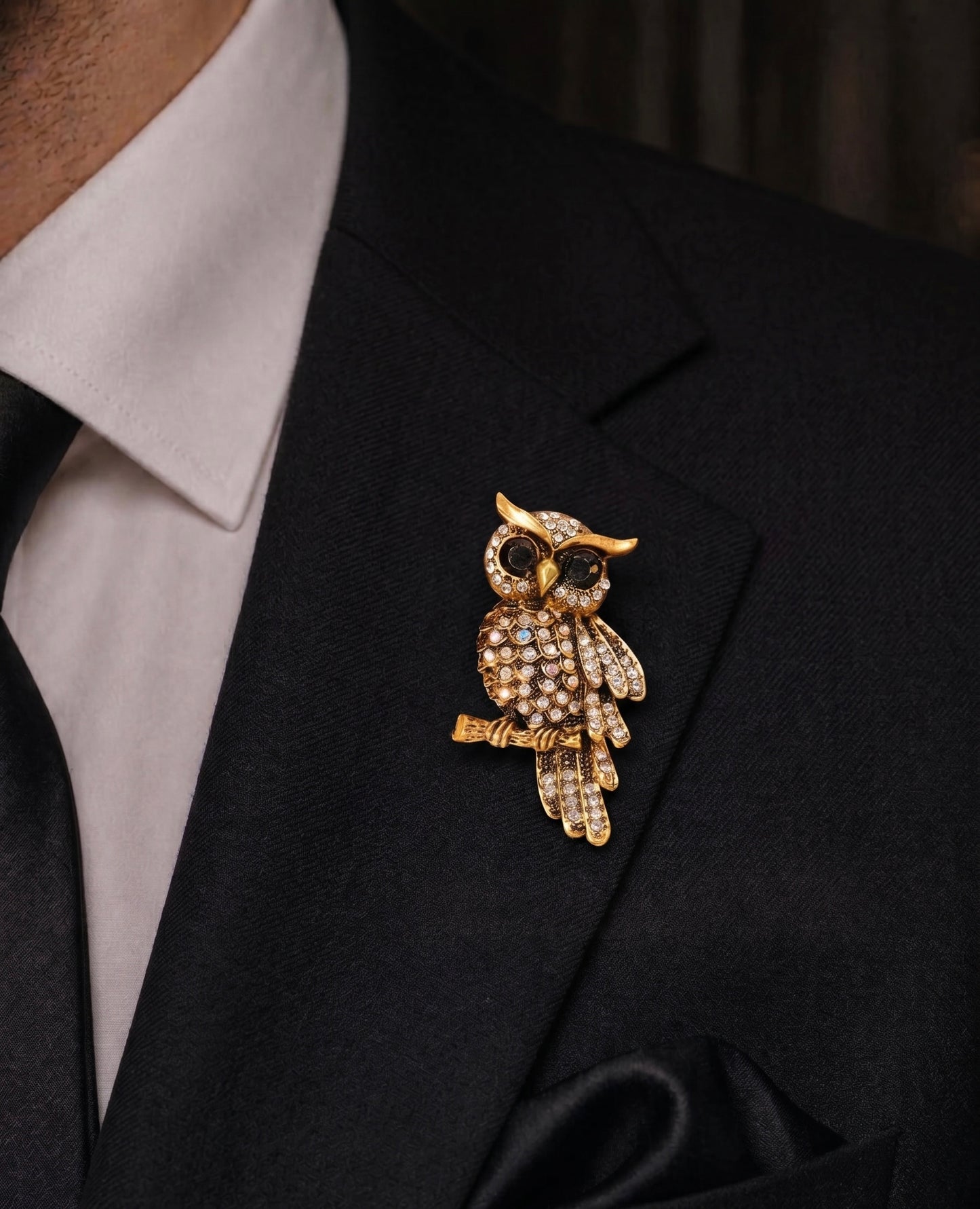 Golden owl brooch