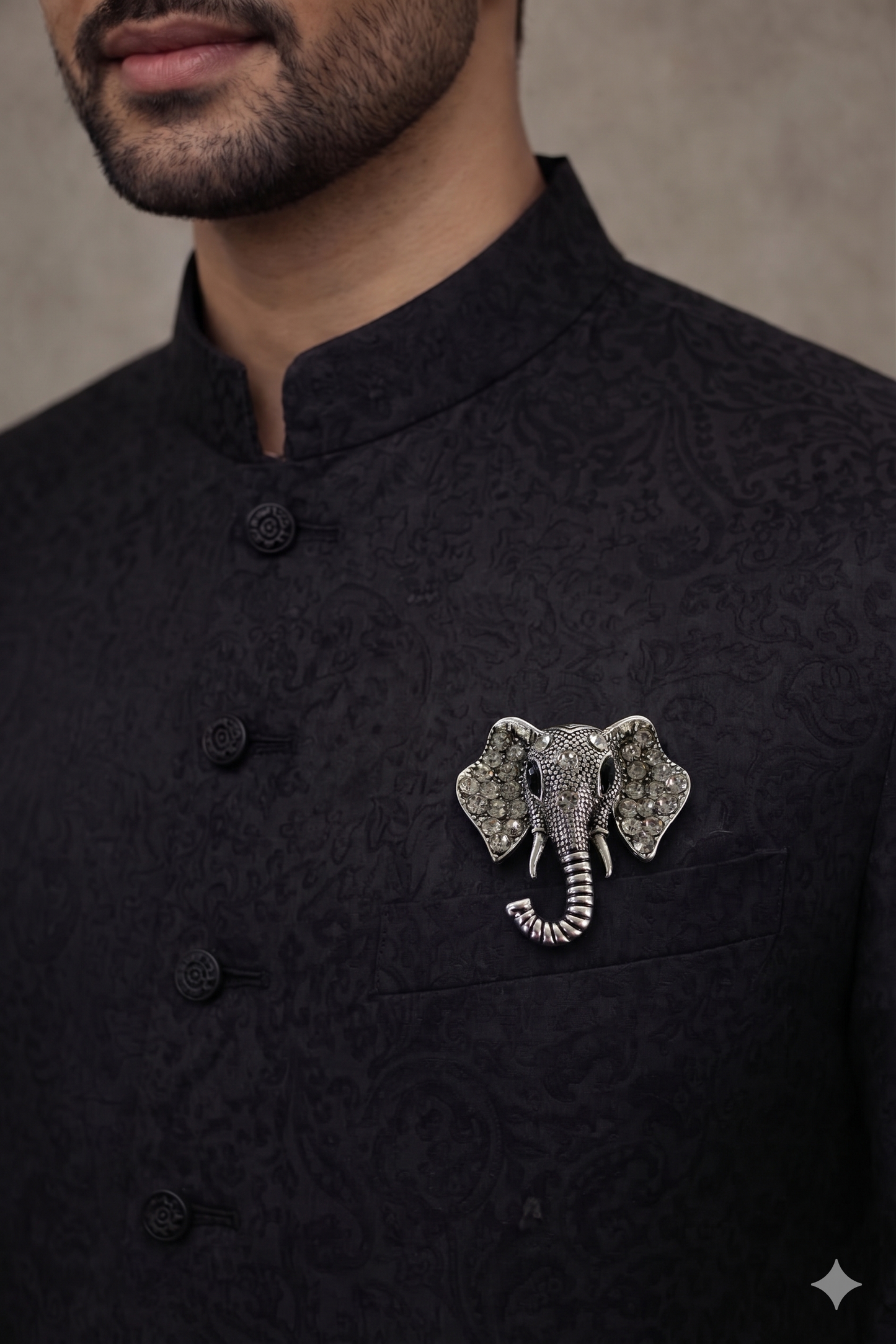 Silver elephant face brooch