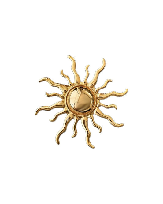 Metal sun brooch